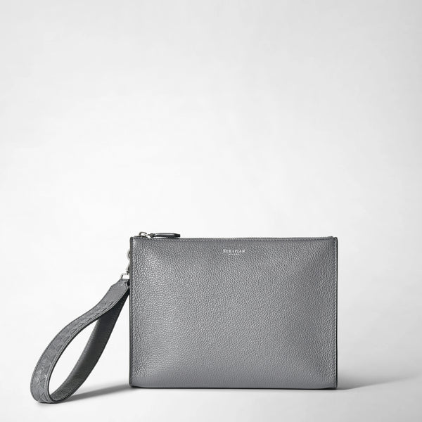 Frontal view: CLUTCH IN CACHEMIRE LEATHER AND MOSAICO shows a gray, pebbled leather clutch with an attached wrist handle and subtle metallic branding at the top center.