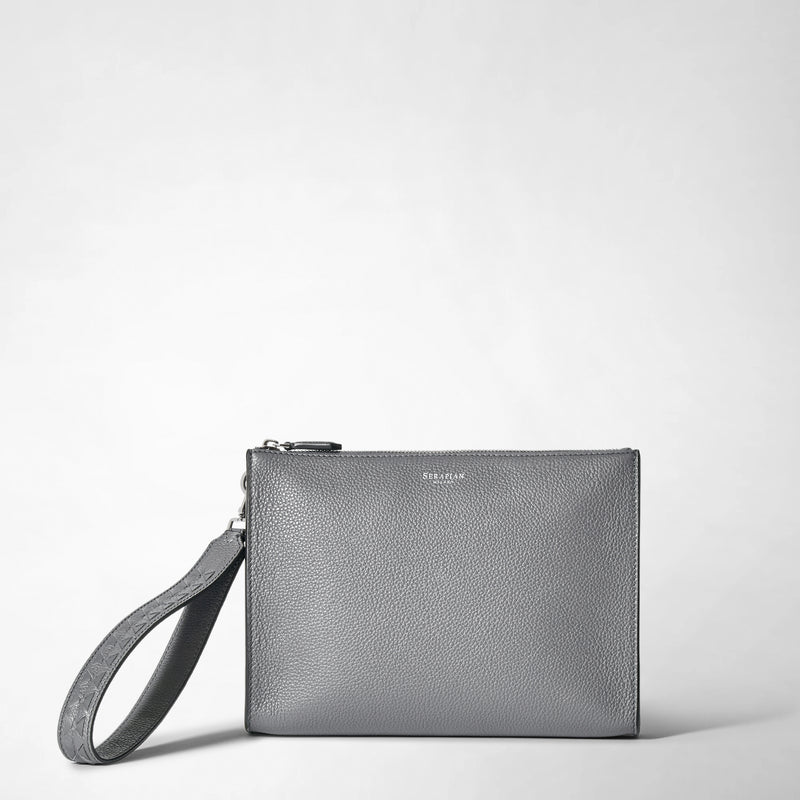 Frontal view: CLUTCH IN CACHEMIRE LEATHER AND MOSAICO shows a gray, pebbled leather clutch with an attached wrist handle and subtle metallic branding at the top center.