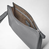 Detail view: CLUTCH IN CACHEMIRE LEATHER AND MOSAICO shows an open gray leather clutch with a wrist strap, visible inner compartments, and a soft brown lining.
