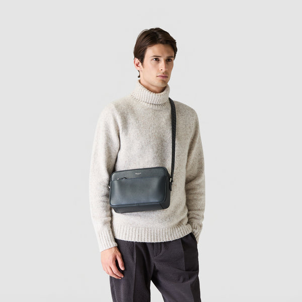 East west crossbody bag in cachemire leather - navy blue