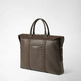 Front view: SOFT BRIEFCASE IN CACHEMIRE LEATHER AND MOSAICO stands upright against a light background; the espresso-colored leather bag features two handles, a zipper, and decorative Mosaico strips.