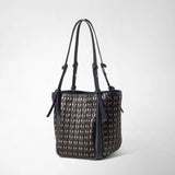 Front view: BUCKET IN MOSAICO MESTIERI D'ARTE stands against a light background; the black leather bag features an intricate woven pattern with gold-tone accents and long handles.