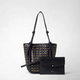 Front view: BUCKET IN MOSAICO MESTIERI D'ARTE in black three-color braided leather with long knotted straps, next to a matching clutch with the inscription “SERAPIAN MILANO”.