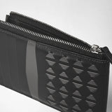 Detail view: ZIP CARD CASE IN MOSAICO shows a black card case with geometric hand-woven Mosaico pattern, card slots, and a zippered pocket seen from above.