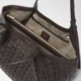 Detail view: SMALL SECRET TOTE BAG IN RIBBON MOSAICO, open with a woven leather exterior, light lining, and zip pocket; “SERAPIAN,” “MADE IN ITALY,” and “SERAPIAN MILANO” are visible.
