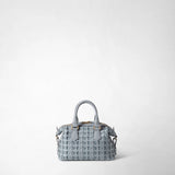 Front view: MINI ANI BAG IN RIBBON MOSAICO stands against a light background; the ice-blue mini bag features a three-dimensional woven pattern, two handles, and gold-tone hardware.