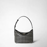 Frontal view: SMALL ANI SHOULDER BAG IN MOSAICO featuring a compact shoulder bag with black and off-white geometric mosaico leather pattern and an adjustable black strap.