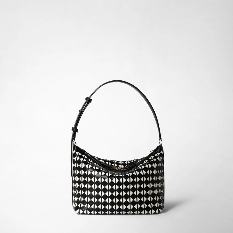 Frontal view: SMALL ANI SHOULDER BAG IN MOSAICO featuring a compact shoulder bag with black and off-white geometric mosaico leather pattern and an adjustable black strap.