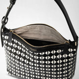 Detail view: SMALL ANI SHOULDER BAG IN MOSAICO shows a black and off-white shoulder bag with a geometric woven leather pattern, gold zipper, and adjustable strap. Interior features soft lining. Visible text: 'SERAPIAN MILANO'.