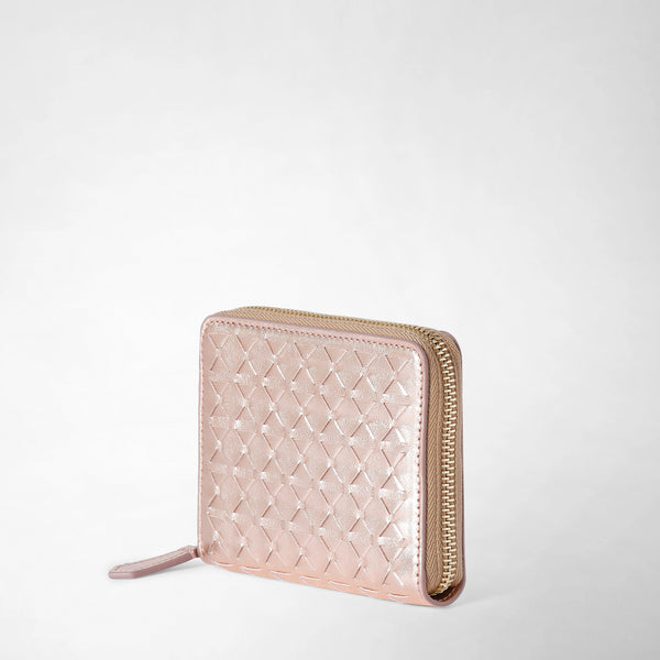 Angled view of a MINI ZIP WALLET IN MOSAICO in buttery soft pink Mosaico nappa leather with zip-around closure and graphic woven pattern.