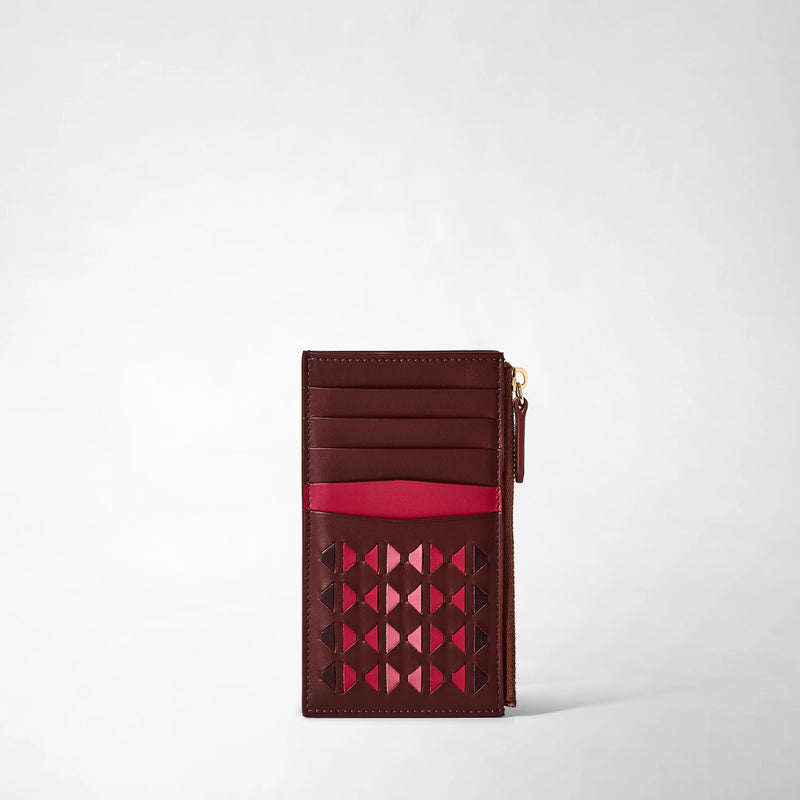 Frontal view: ZIP CARD CASE IN MOSAICO shows a slim, rosewood-colored leather card case with geometric pink mosaic weaving, card slots, and a zippered pocket on the right edge.