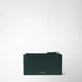 Front view: ZIP CARD CASE IN MOSAICO shows its smooth dark green back with a gold zipper and “SERAPIAN MILANO” embossing against a light background.