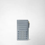 Detail view: ZIP CARD CASE IN MOSAICO in Arctic Blue leather with a geometric Mosaico pattern, card slots, and a side zipper against a light background.