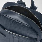 Detail view: BACKPACK IN STEPAN shows an open main compartment with silver zippers, dark blue S-embossed canvas, and leather details against a neutral background.