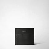 Frontal view: 6-CARD BILLFOLD WALLET IN STEPAN displays a black wallet with textured lower canvas and smooth upper leather, showing 'SERAPIAN MILANO' in white text.