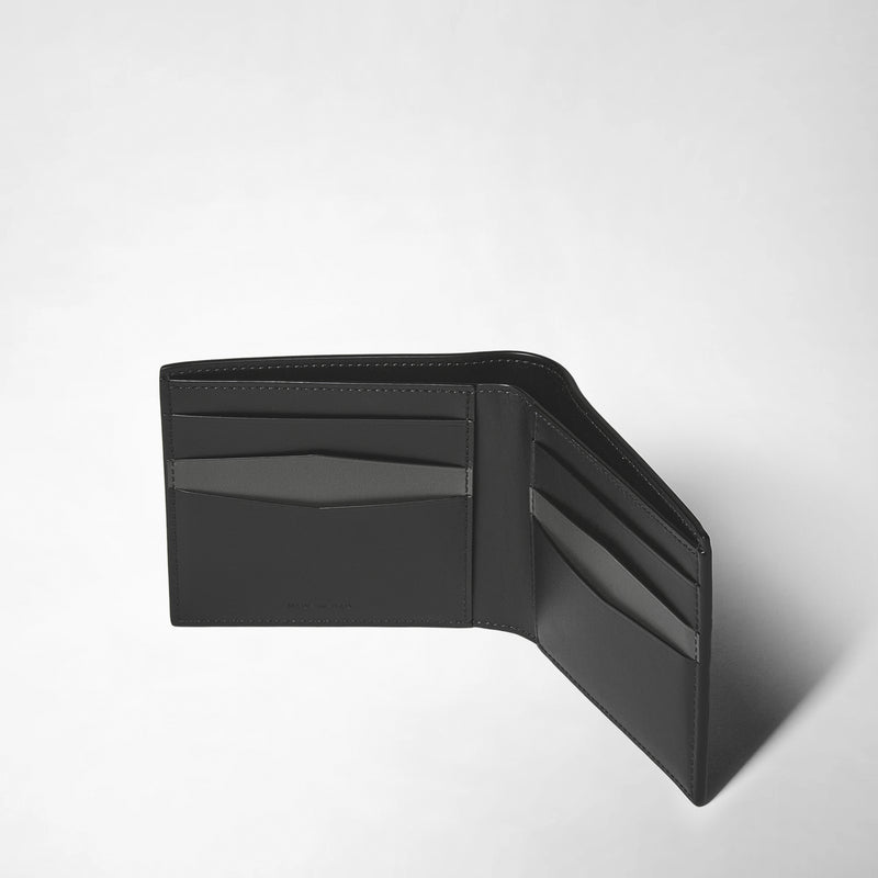 Frontal view: 6-CARD BILLFOLD WALLET IN STEPAN displayed open, showing black leather interior with six card slots and additional pockets for notes and receipts.