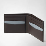 Detail view: 6-CARD BILLFOLD WALLET IN STEPAN is open, showing dark brown card slots with ice-blue accents and the imprint “MADE IN ITALY”.