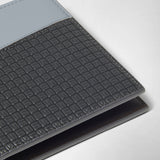 Detail view: 6-CARD BILLFOLD WALLET IN STEPAN shows an asphalt-gray embossed surface with light blue leather trim and neat stitching against a light background.