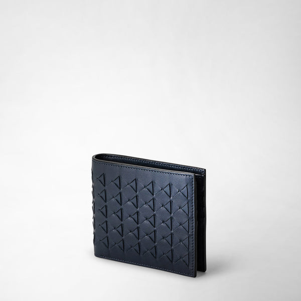 Angled front view: 8-CARD BILLFOLD WALLET IN MOSAICO displaying a navy blue nappa leather wallet with geometric handwoven Mosaico detailing on the exterior.