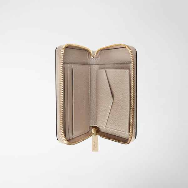 Front view of MINI ZIP AROUND WALLET IN RUGIADA LEATHER, open, displaying Sahara fine-grained leather with card slots and gold-tone zipper.